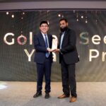Techaccess Pakistan professional receiving Golden Seed of the Year award at Huawei Partner Summit 2026